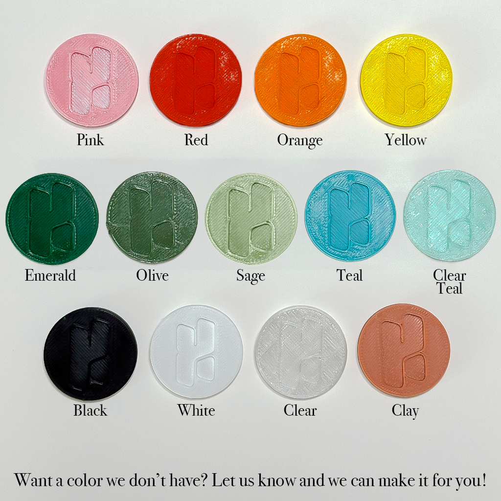 13 filament colors: Pink, Red, Orange, Yellow, Emerald, Olive, Sage, Teal, Clear Teal, Black, White, Clear, and Clay.